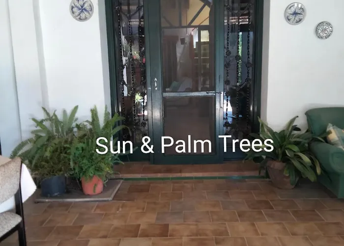 Quarto em Acomodações Particulares Sun & Palm Trees *